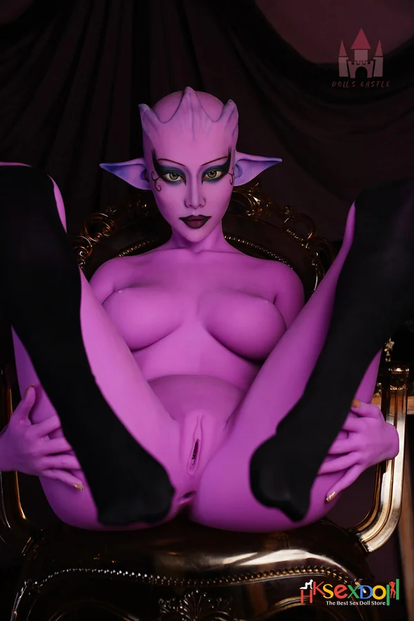purple alien sex doll with pale skin and pointed ears sits elegantly in a plush chair